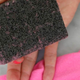 The Laundress sweater stone is basically a volcanic rock that picks up lint and pills with the power of friction. It works great!